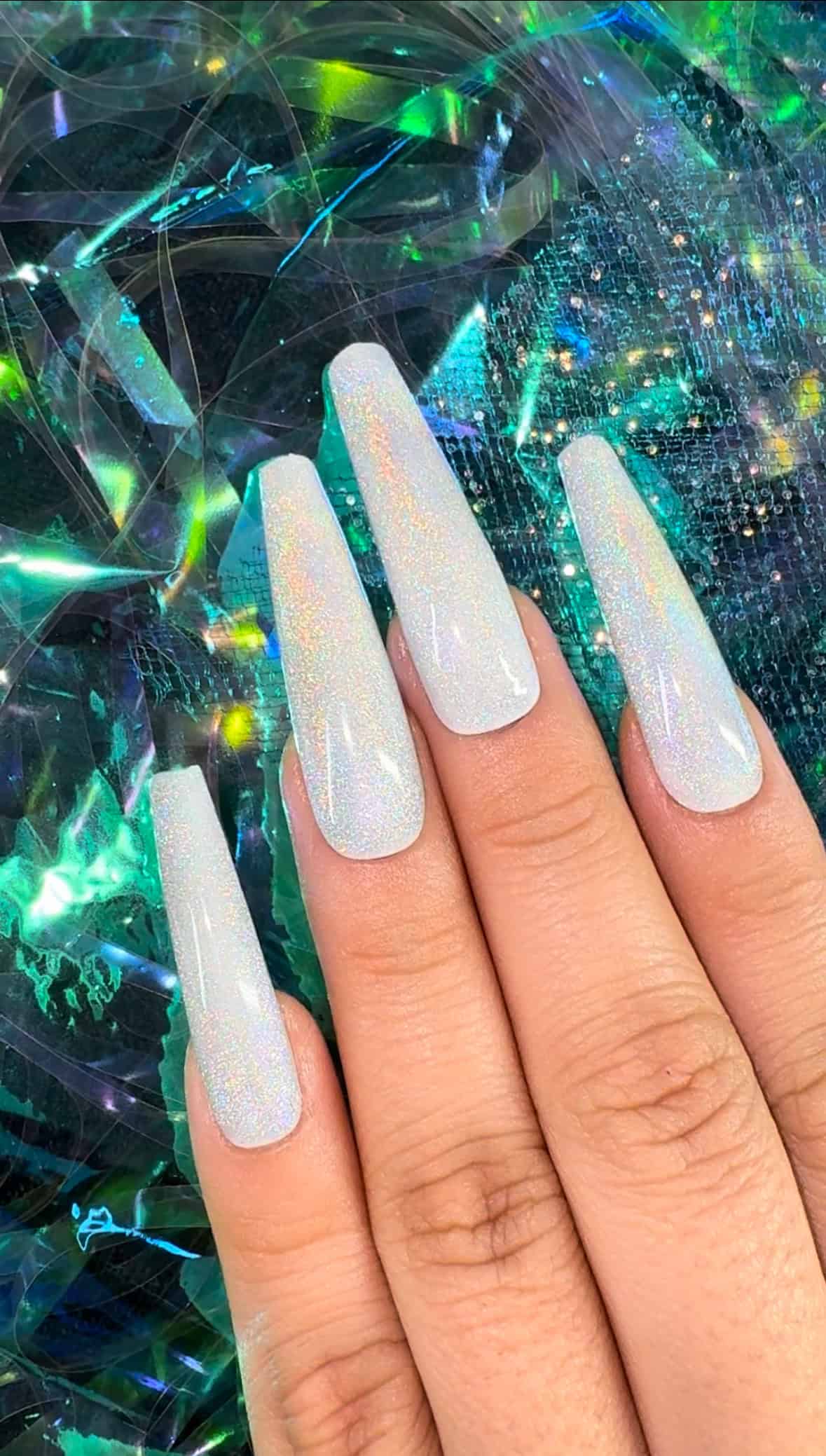 Unleash the Magic on Your Nails: “Rainbow Cat Eye” Tutorial